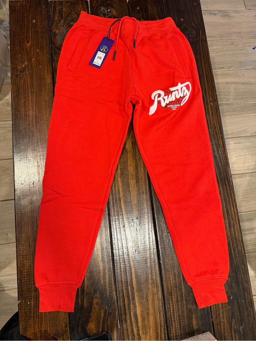 Rusty Worldwide women’s red joggers.